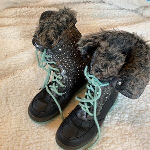 Justice snow boots still life left in them